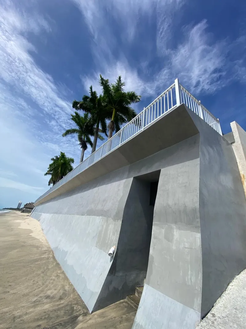 Foto 7 de Muro Rompeolas Familia Harari